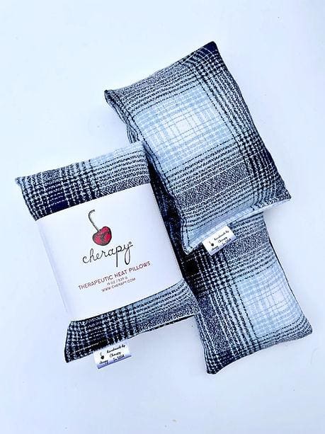 Three CHERAPY – Therapeutic Wrap Pillows (SUPER SOFT) in Blue and White Plaid Design with a label that says "Cherapy Therapeutic Heat Pillows.