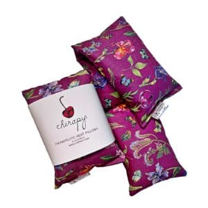 Set of three pink therapeutic heat pillows with a floral and butterfly design, branded as "CHERAPY Wrap Pillow 100 Percent (REGULAR) Cotton – in the Spring Flower Butterfly Design.