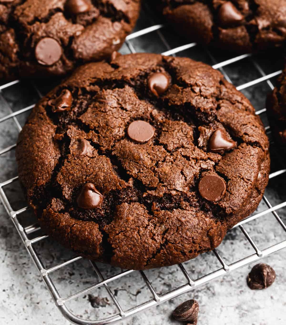 Double chocolate chip cookies on cooling rack