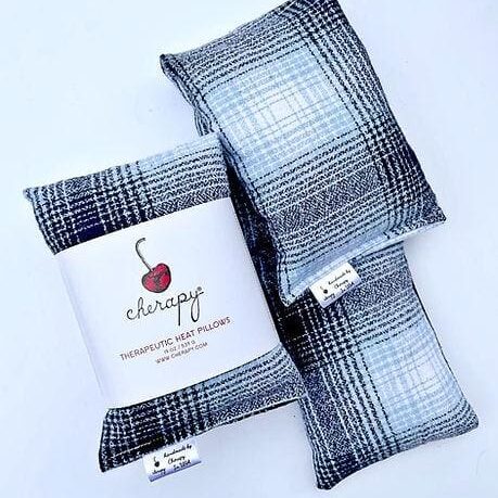 Three CHERAPY – Therapeutic Wrap Pillows (SUPER SOFT) in Blue and White Plaid Design with a label that says "Cherapy Therapeutic Heat Pillows.